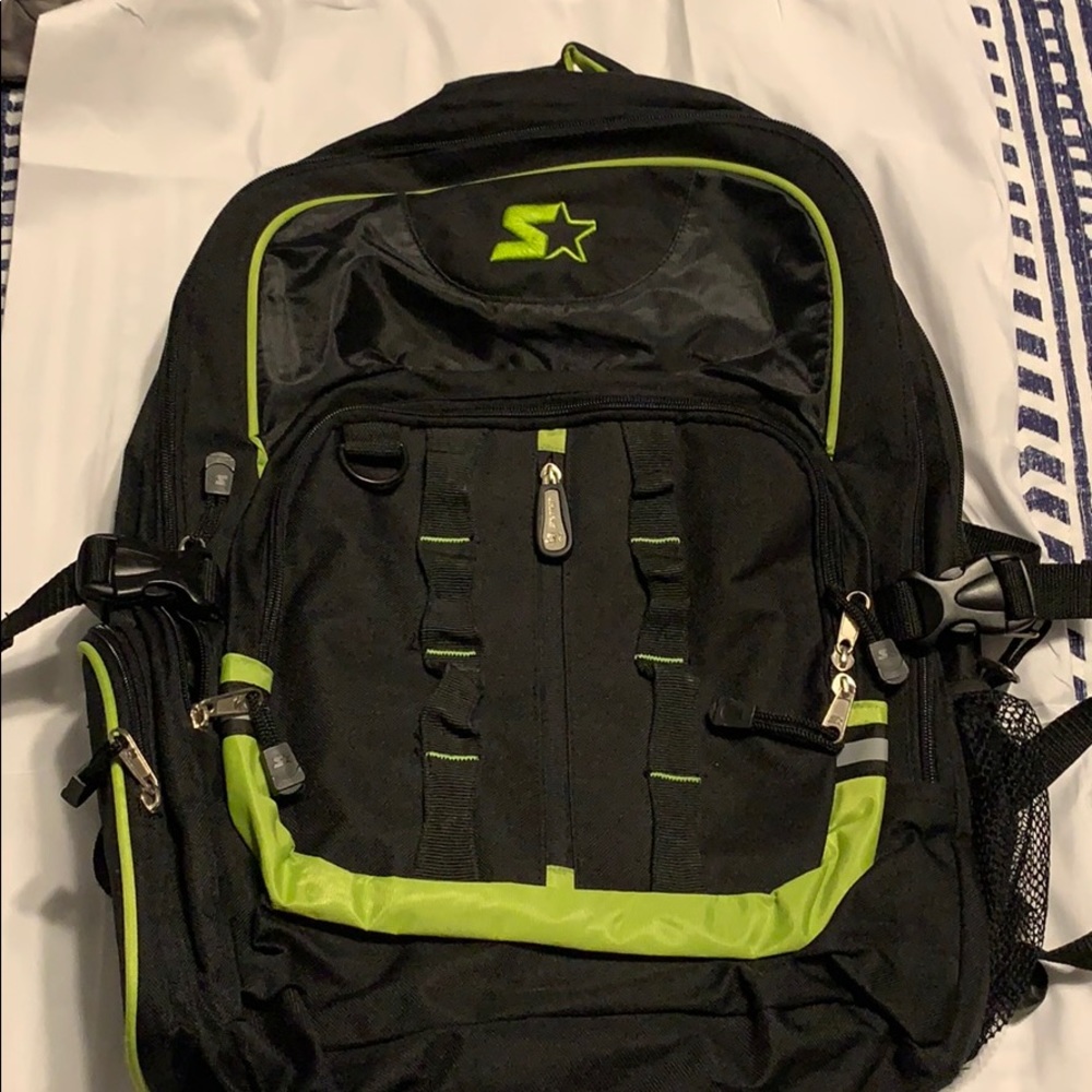 Lightly used men’s black and green backpack.